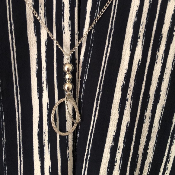 Woman’s fall notations V-neck blue and white striped blouse with hooked chain - Picture 10 of 14